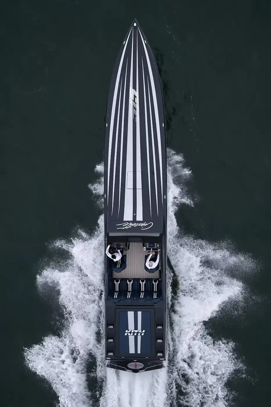 KITH PARTNERS WITH CIGARETTE RACING, BRINGING LUXURY TO WATERS image about the collaboration between fashion brand Kith and boat manufacturer Cigarette Racing. It describes three custom luxury powerboats (the 515, 42' X, and 42' Auroris) with unique design features including custom paint jobs, branded interiors, and integrated technology systems. The article mentions the boats will be available made-to-order beginning May 16 with prices starting at $1.6 million, and that Kith has also created an accompanying apparel collection. (image 16 of 20)
