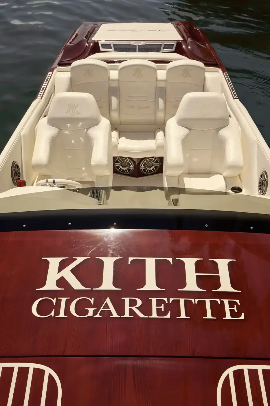 KITH PARTNERS WITH CIGARETTE RACING, BRINGING LUXURY TO WATERS image about the collaboration between fashion brand Kith and boat manufacturer Cigarette Racing. It describes three custom luxury powerboats (the 515, 42' X, and 42' Auroris) with unique design features including custom paint jobs, branded interiors, and integrated technology systems. The article mentions the boats will be available made-to-order beginning May 16 with prices starting at $1.6 million, and that Kith has also created an accompanying apparel collection. (image 9 of 20)
