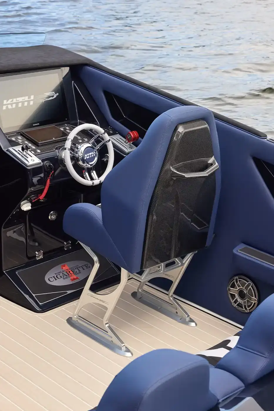 KITH PARTNERS WITH CIGARETTE RACING, BRINGING LUXURY TO WATERS image about the collaboration between fashion brand Kith and boat manufacturer Cigarette Racing. It describes three custom luxury powerboats (the 515, 42' X, and 42' Auroris) with unique design features including custom paint jobs, branded interiors, and integrated technology systems. The article mentions the boats will be available made-to-order beginning May 16 with prices starting at $1.6 million, and that Kith has also created an accompanying apparel collection. (image 15 of 20)