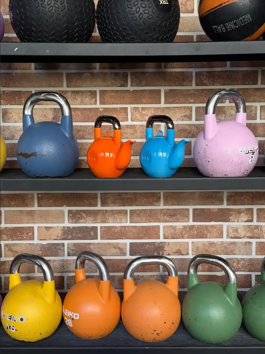 KPM BERLIN AND SUCUK UND BRATWURST DROP A KETTLEBELL TEAPOT image about a limited edition porcelain teapot shaped like a kettlebell, made in collaboration between KPM Berlin and Sucuk und Bratwurst, available from June 2026. (image 2 of 9)