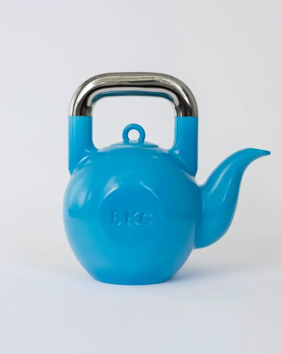 KPM BERLIN AND SUCUK UND BRATWURST DROP A KETTLEBELL TEAPOT image about a limited edition porcelain teapot shaped like a kettlebell, made in collaboration between KPM Berlin and Sucuk und Bratwurst, available from June 2026. (image 8 of 9)