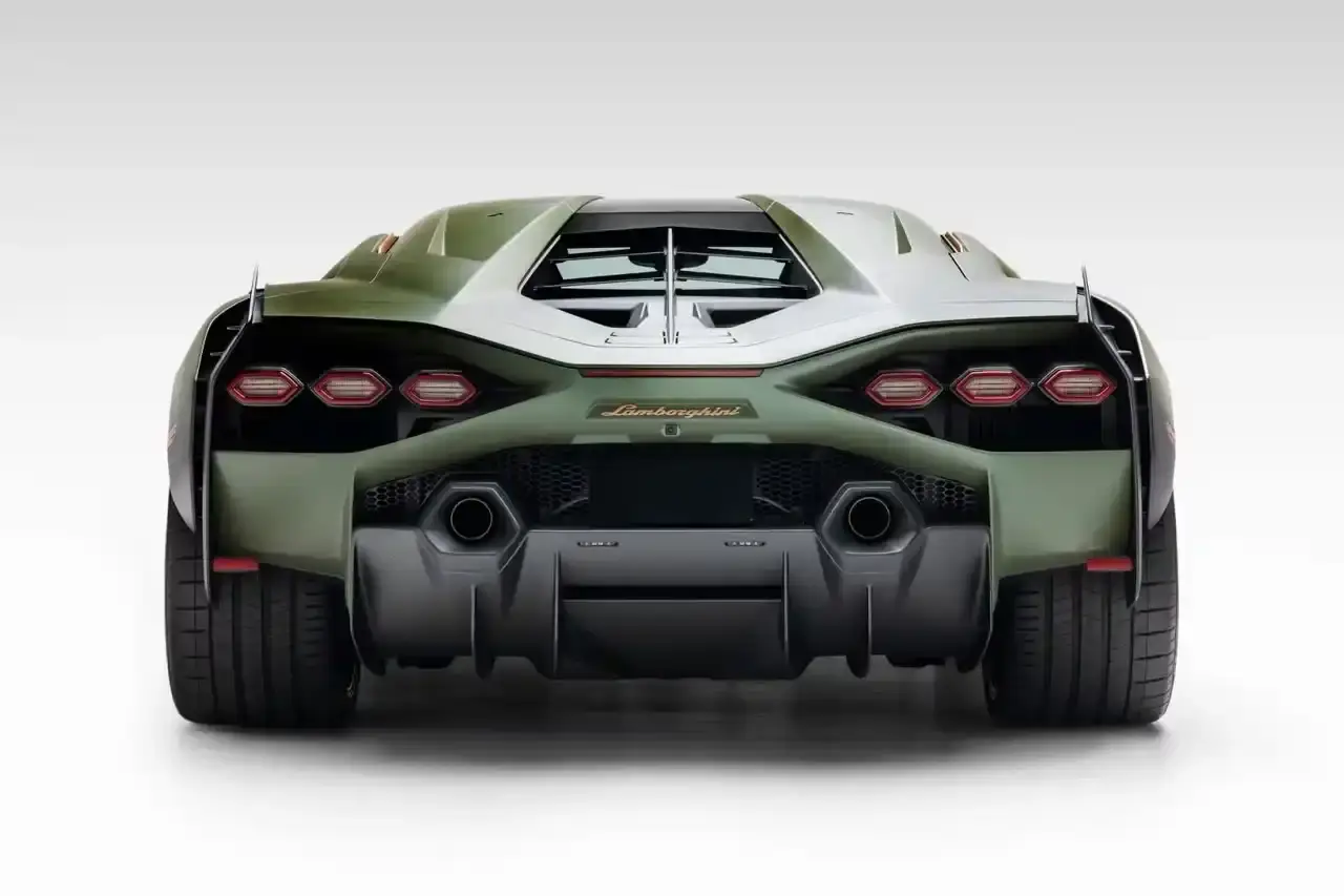 Bring A Trailer Verde Triton 2021 Lamborghini Sián FKP 37 hybrid supercar with gold wheels photographed in profile view showing its aerodynamic design. (image 6 of 9)