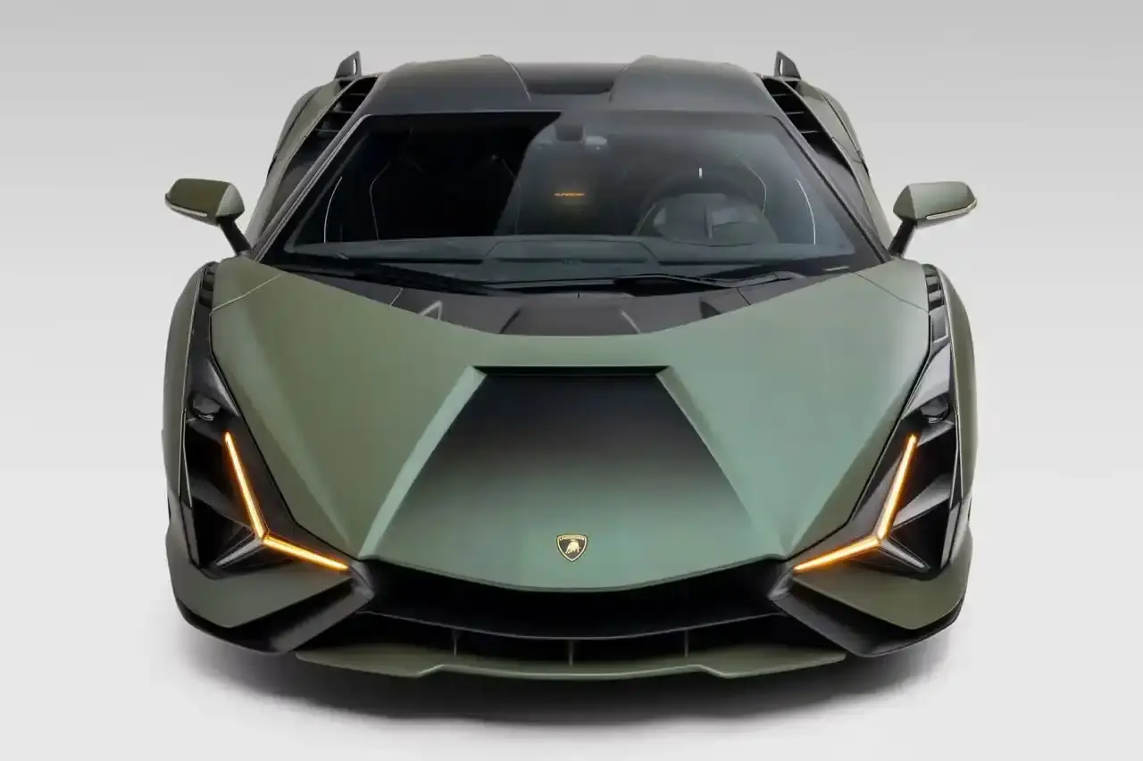 Bring A Trailer Verde Triton 2021 Lamborghini Sián FKP 37 hybrid supercar with gold wheels photographed in profile view showing its aerodynamic design. (image 2 of 9)