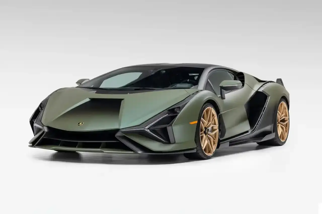 Bring A Trailer Verde Triton 2021 Lamborghini Sián FKP 37 hybrid supercar with gold wheels photographed in profile view showing its aerodynamic design.