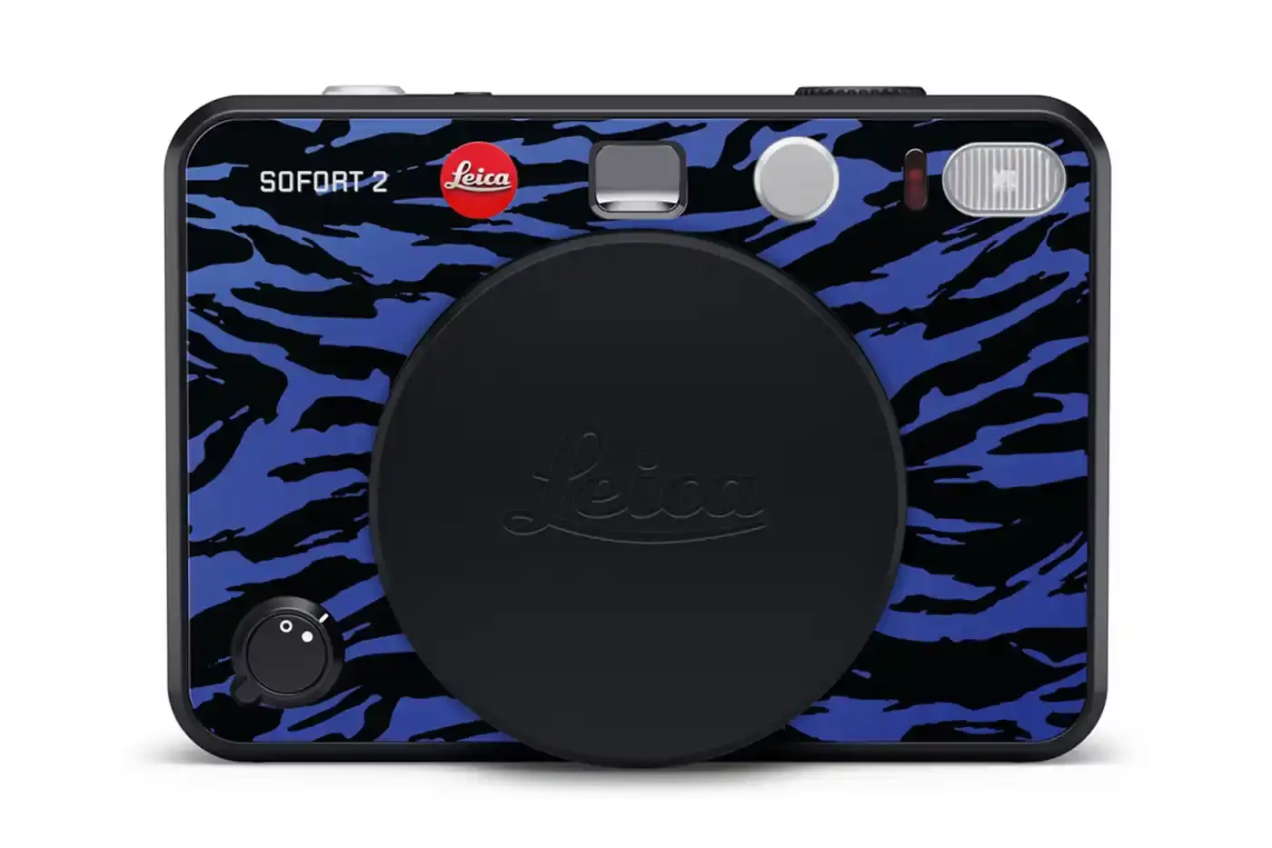 Leica The Leica SOFORT 2 Burton Edition instant camera, featuring Burton's signature pattern on a black camera body with the Burton logo on top. A matching Burton-designed camera bag sits beside it. (image 2 of 6)