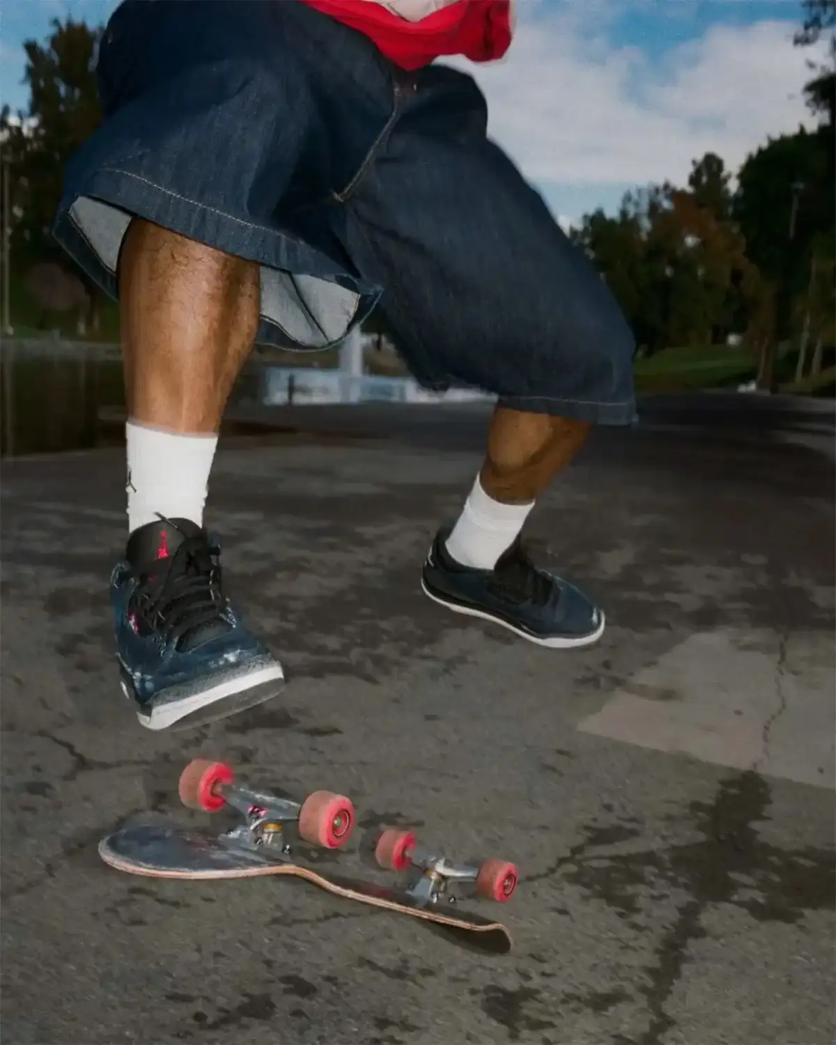 LEVI'S AND JORDAN BRAND UNVEIL AIR JORDAN 3 COLLECTION Article about the new Levi's and Jordan Brand collaboration featuring Air Jordan 3 sneakers in denim materials and a matching apparel collection inspired by 1990s style. (image 2 of 9)