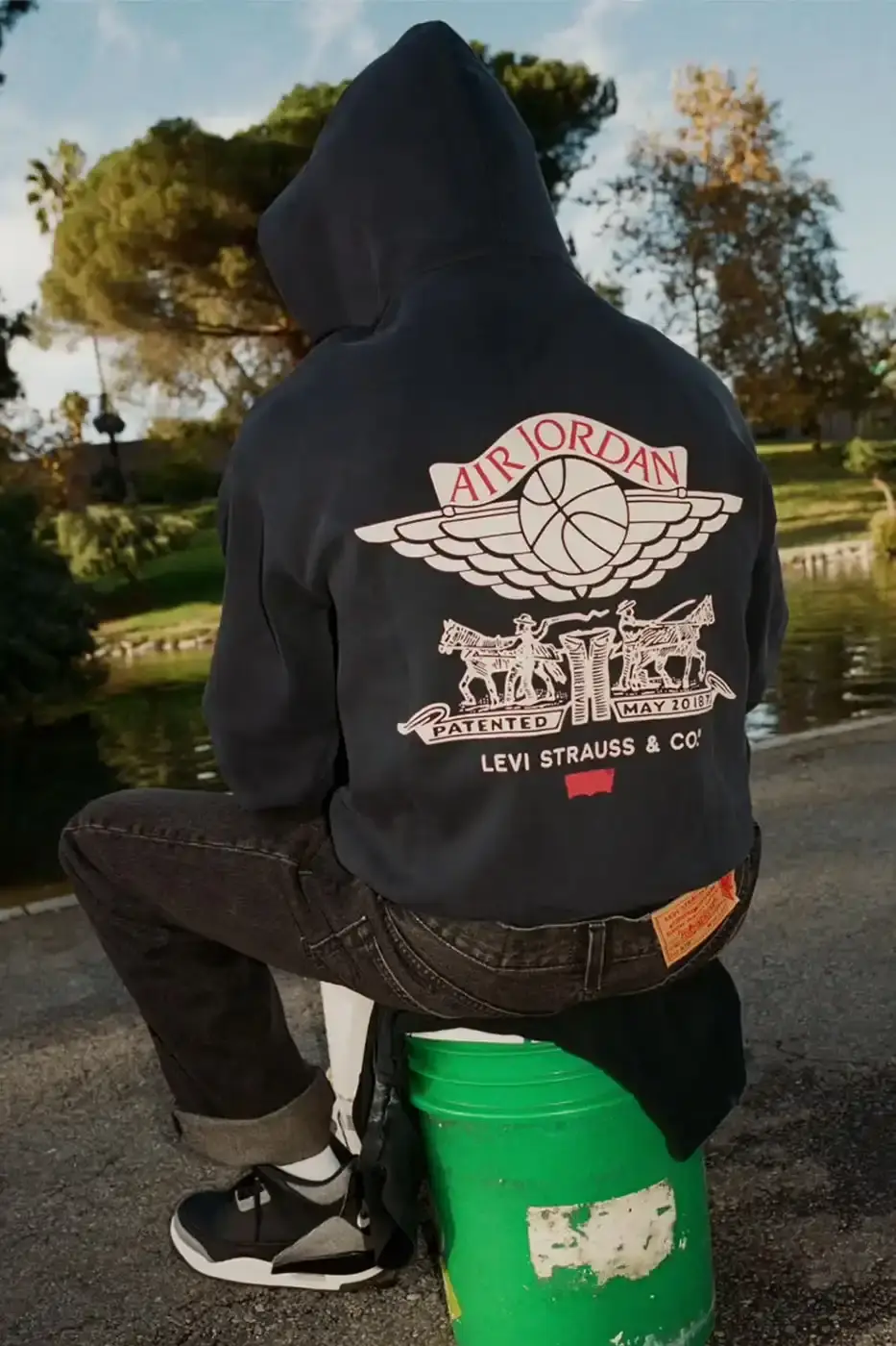 LEVI'S AND JORDAN BRAND UNVEIL AIR JORDAN 3 COLLECTION Article about the new Levi's and Jordan Brand collaboration featuring Air Jordan 3 sneakers in denim materials and a matching apparel collection inspired by 1990s style. (image 3 of 9)