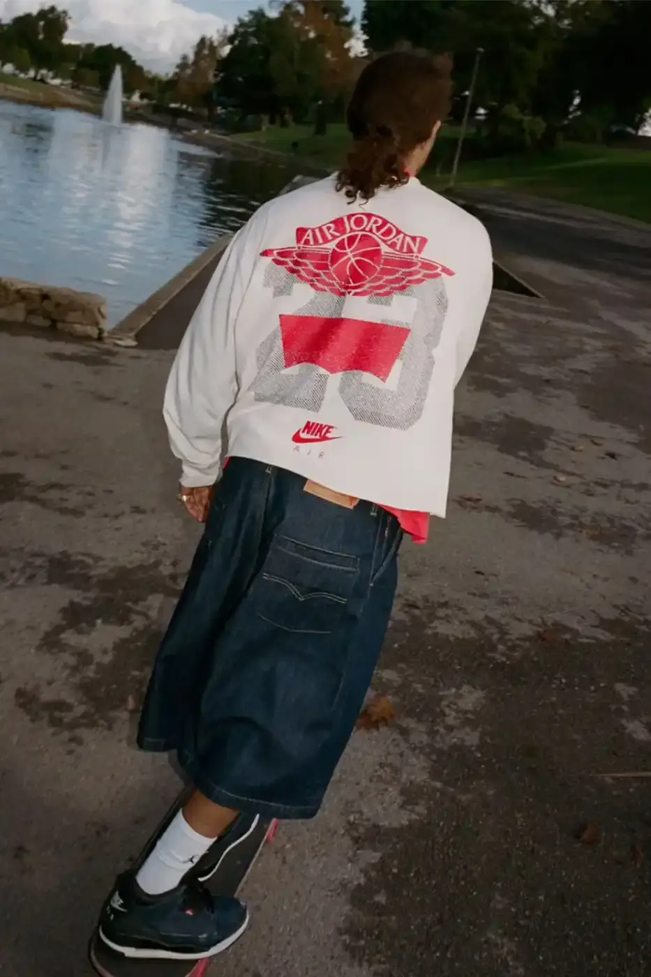 LEVI'S AND JORDAN BRAND UNVEIL AIR JORDAN 3 COLLECTION Article about the new Levi's and Jordan Brand collaboration featuring Air Jordan 3 sneakers in denim materials and a matching apparel collection inspired by 1990s style. (image 4 of 9)