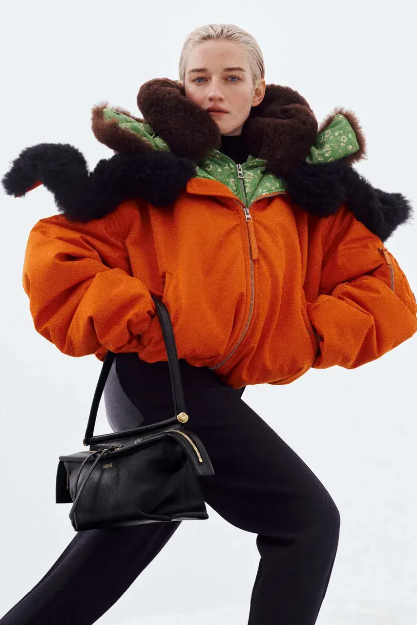 LIL YACHTY LEADS LOEWE FALL CAMPAIGN image detailing musician Lil Yachty and actress Julia Garner starring in a LOEWE fashion campaign filmed in the Alps. (image 4 of 11)
