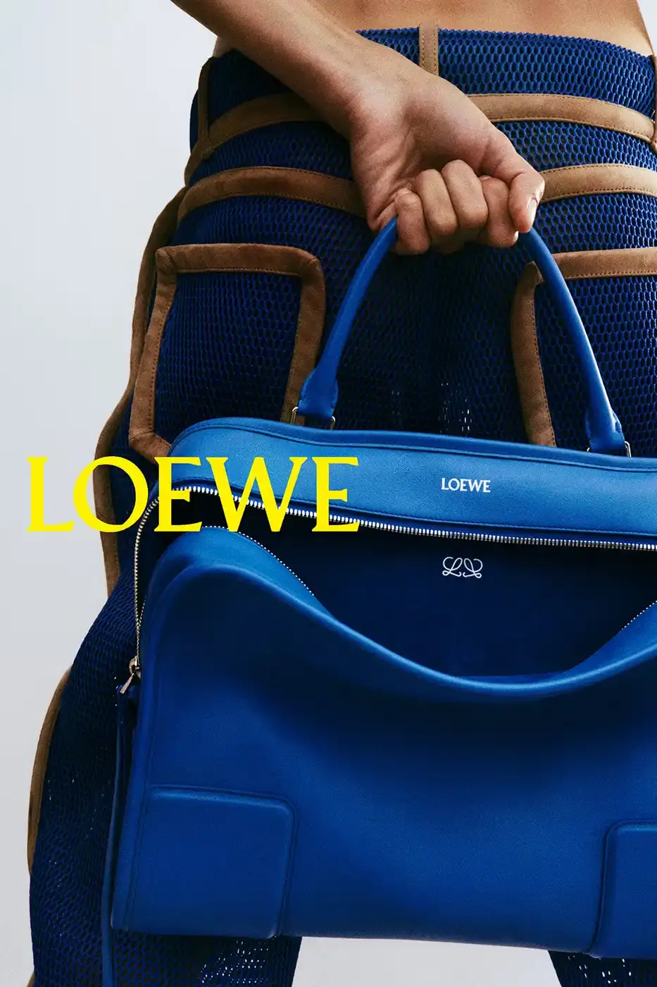 LOEWE SPRING SUMMER 2026 CAMPAIGN GUIDE image detailing the Loewe Spring Summer 2026 fashion campaign. The text describes clothing designs, campaign actors, and release schedules. (image 15 of 25)
