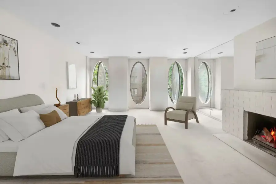 MANHATTAN'S 1960S BUBBLE HOUSE LISTS FOR $5.75M image about a unique Manhattan townhouse featuring circular windows, designed by architect Maurice Medcalfe in 1969, now for sale at $5.75 million. Includes property details, architectural history, and neighborhood context. (image 2 of 5)