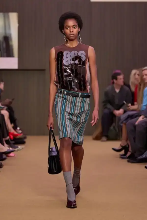 MARNI'S RETURN TO ITS ROOTS UNDER MERYLL ROGGE image of Meryll Rogge's first collection as creative director of Marni, covering design direction, materials, and the installation by Formafantasma. (image 3 of 9)
