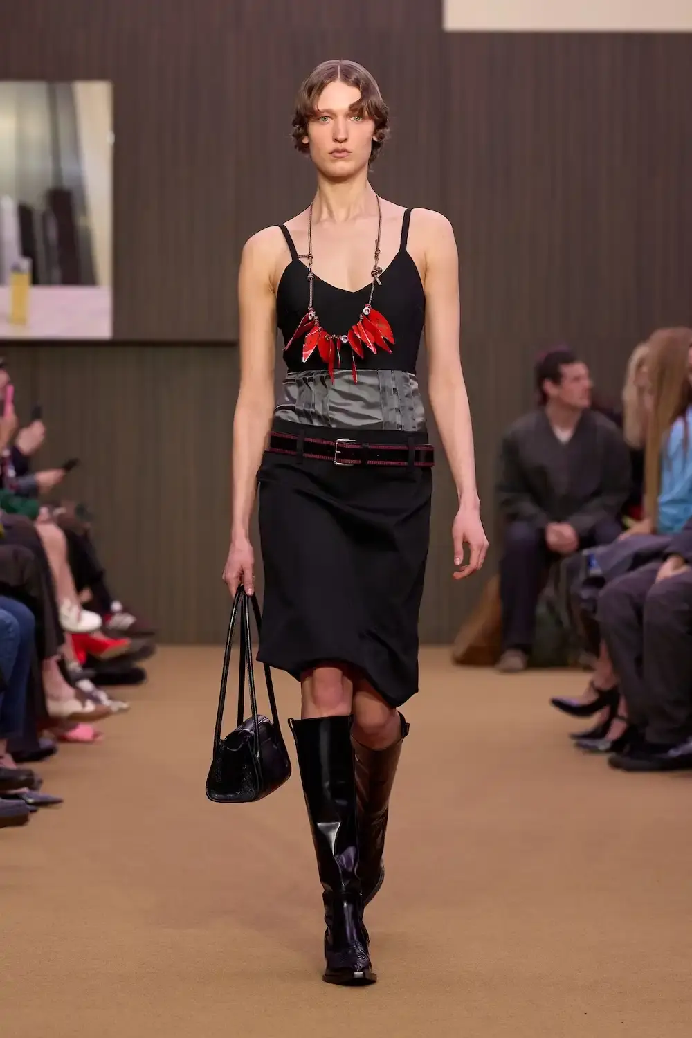 MARNI'S RETURN TO ITS ROOTS UNDER MERYLL ROGGE image of Meryll Rogge's first collection as creative director of Marni, covering design direction, materials, and the installation by Formafantasma. (image 9 of 9)