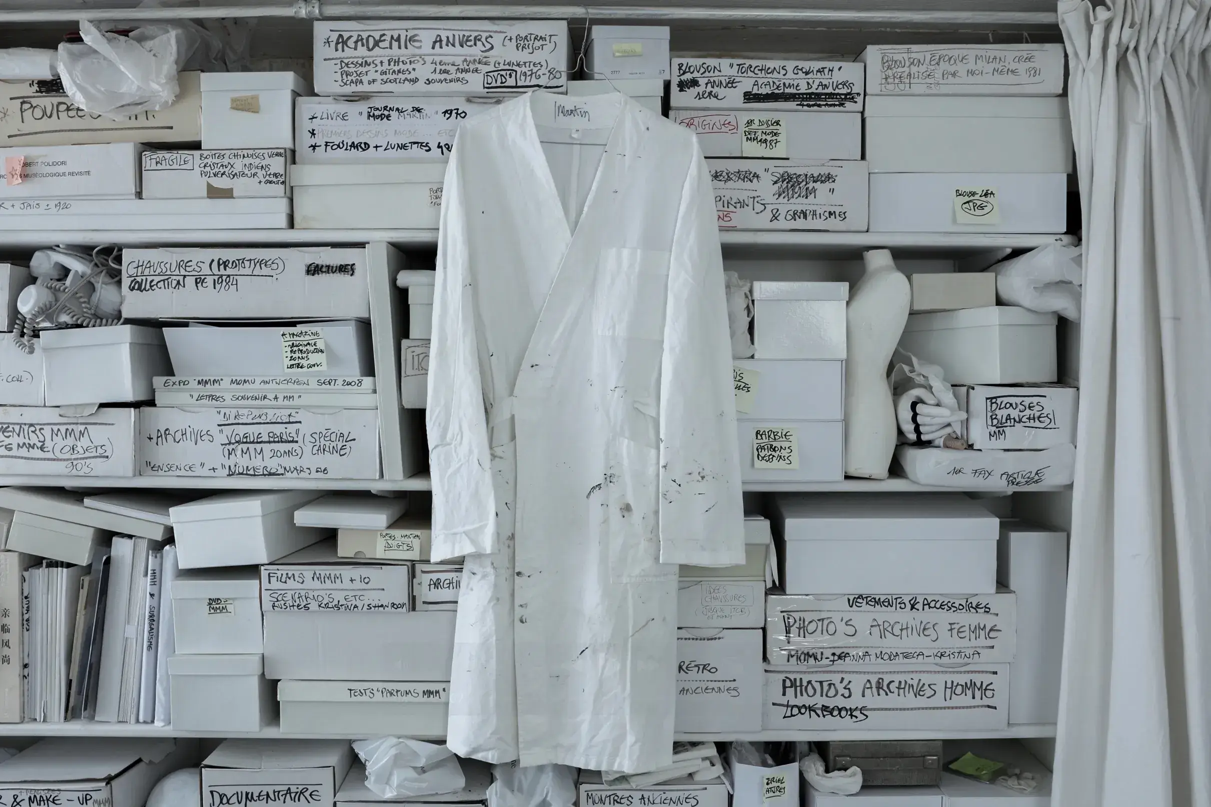 image detailing the sales figures and specific items from the Martin Margiela fashion archive auction in Paris.