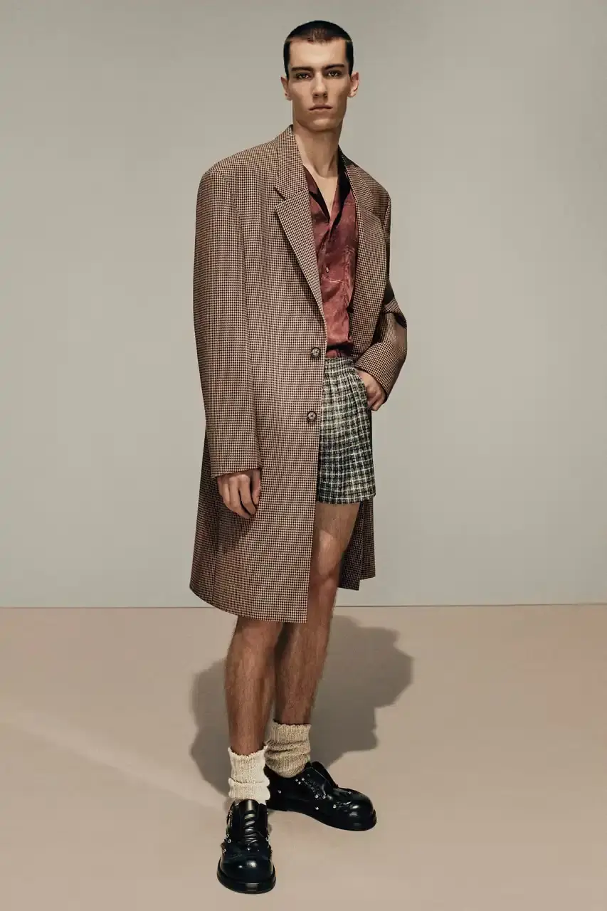 Acne Studios Model in 1970s-inspired checked two-piece suit from Acne Studios FW25 collection