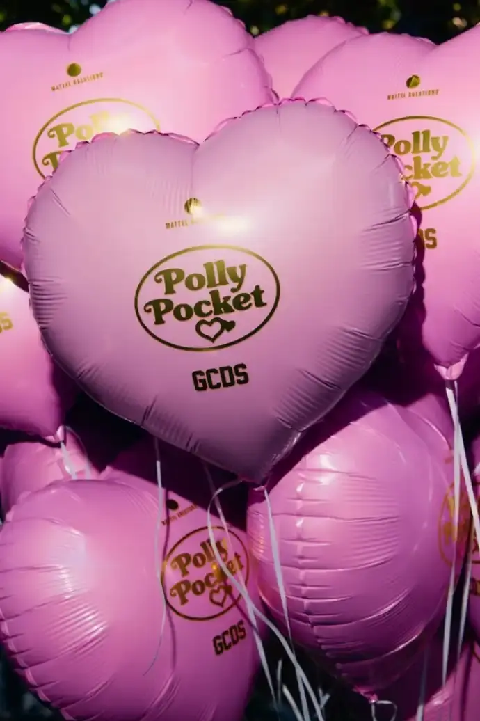 MATTEL PARTNERS WITH GCDS FOR POLLY POCKET COLLECTION Image about a business collaboration between toy company Mattel and Italian fashion house GCDS to create a limited-edition Polly Pocket collection. The article includes details about product availability, previous partnerships between the brands, and background information about both companies. Contains no images, videos, or interactive elements requiring additional accessibility considerations. (image 2 of 15)