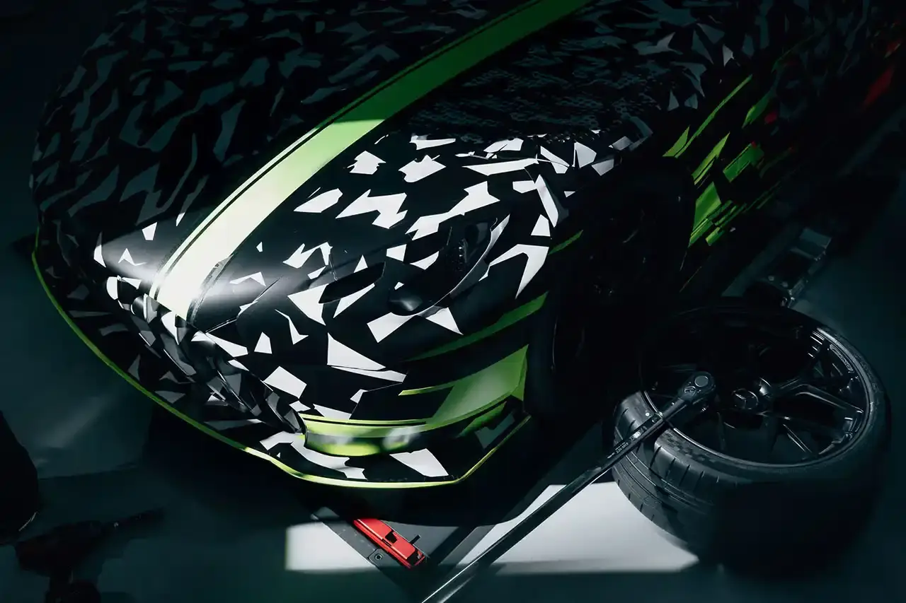 MERCEDES-AMG SHOWS TRACK CONCEPT image discusses Mercedes-AMG's new CONCEPT AMG GT TRACK SPORT prototype. The text covers the vehicle's V8 powertrain, Affalterbach production location, track-focused design goals, and development timeline. Content includes details about the concept's motorsport engineering approach and its role in expanding the AMG GT family beyond current road car offerings. (image 4 of 4)