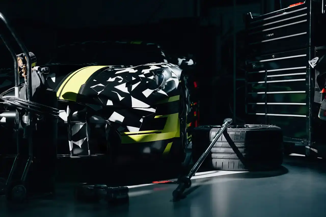 MERCEDES-AMG SHOWS TRACK CONCEPT image discusses Mercedes-AMG's new CONCEPT AMG GT TRACK SPORT prototype. The text covers the vehicle's V8 powertrain, Affalterbach production location, track-focused design goals, and development timeline. Content includes details about the concept's motorsport engineering approach and its role in expanding the AMG GT family beyond current road car offerings. (image 2 of 4)