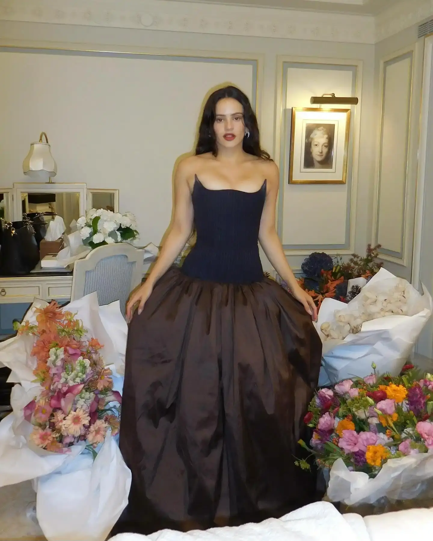 image reports on fashion designer Miguel Adrover's decision to decline a collaboration request from Spanish singer Rosalía's team. Adrover shared his rejection on social media, explaining that he only works with artists who have publicly supported Palestine during the Gaza conflict. The piece examines the intersection of political activism and professional relationships in creative industries, presenting the facts neutrally without taking sides on the political issues involved. The article includes context about both artists' careers and discusses broader implications for creative collaborations when political beliefs influence business decisions.