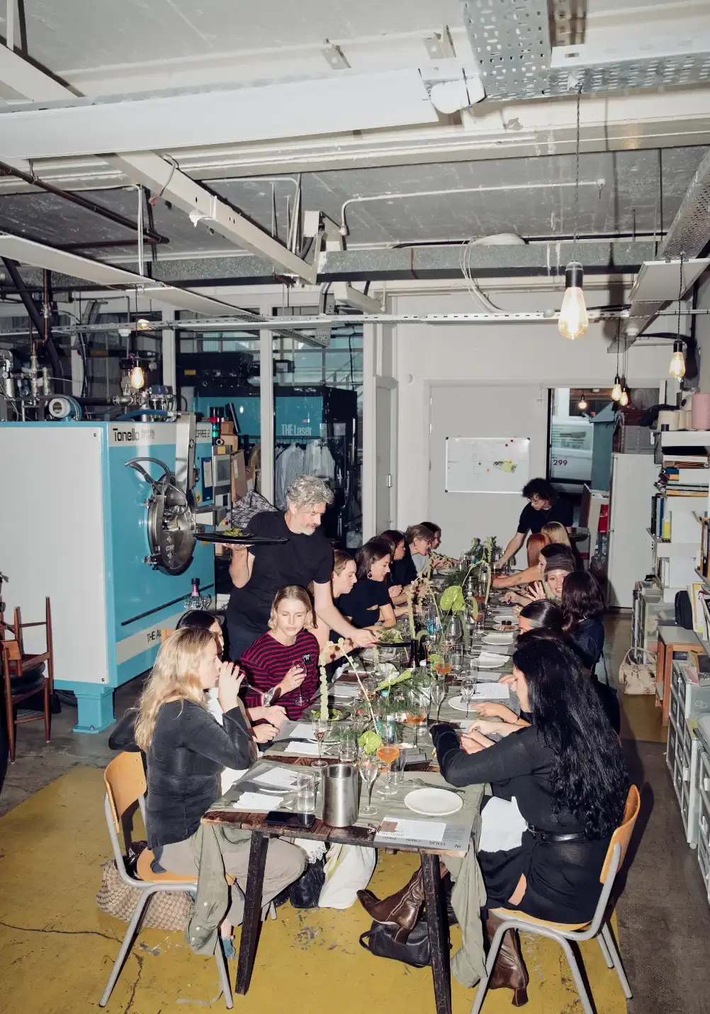 MIISTA HOSTS AW26 EVENT AT SLOWBURN LONDON An image showing Miista's AW26 dinner event at SlowBurn in East London, detailing the multi-functional garments, food presentation, and performance art. (image 5 of 19)