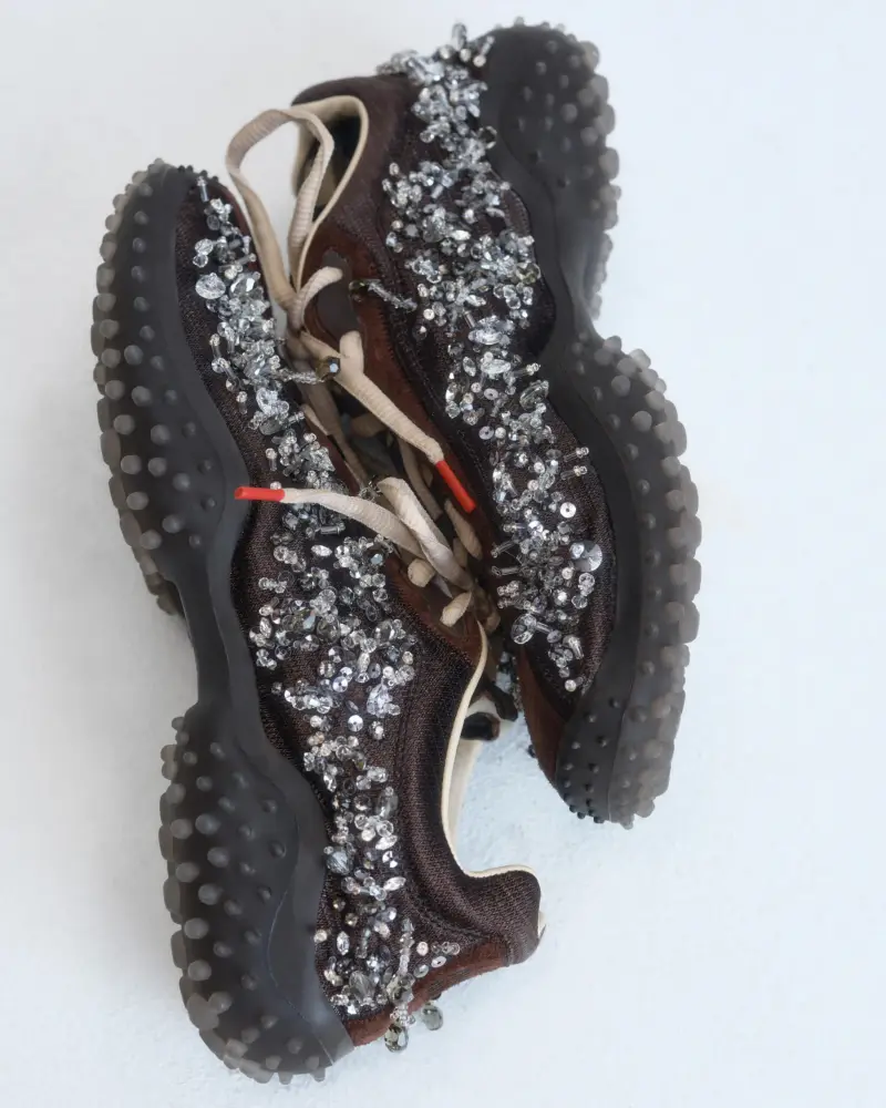 MIU MIU RETURNS BUBBLE SHOES FOR FW26 image describing the return of Miu Miu Bubble footwear, detailing design changes, material updates, and runway history. (image 5 of 7)