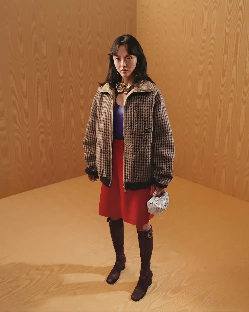 MIU MIU FEATURES KYLIE JENNER IN FALL 2025 CAMPAIGN image about Miu Miu's latest advertising campaign featuring seven diverse women including Kylie Jenner, exploring gender-neutral fashion design through pastel colors and fluid silhouettes for the fall/winter 2025 collection. (image 6 of 6)