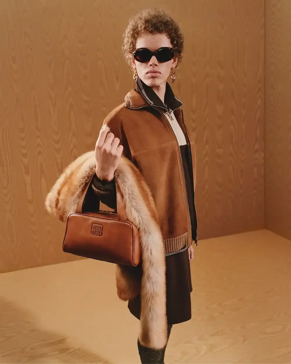 MIU MIU FEATURES KYLIE JENNER IN FALL 2025 CAMPAIGN image about Miu Miu's latest advertising campaign featuring seven diverse women including Kylie Jenner, exploring gender-neutral fashion design through pastel colors and fluid silhouettes for the fall/winter 2025 collection.