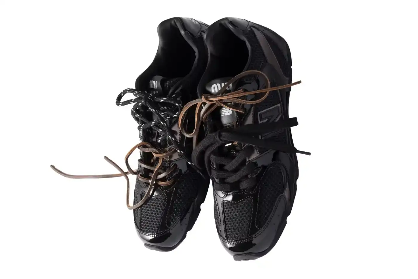 MIU MIU X NEW BALANCE 530SL DROPS image about the latest Miu Miu and New Balance sneaker collaboration featuring three colorways with premium materials and luxury design elements. (image 7 of 12)