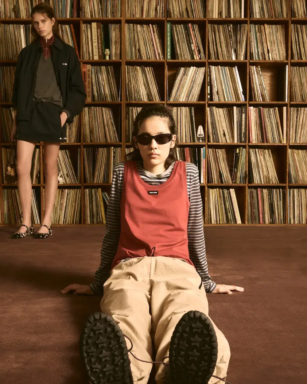 MIU MIU OPENS VINYL CLUB POP-UP SPACES image detailing Miu Miu's Vinyl Club pop-up project, featuring fashion items, custom audio gear, and global location dates.