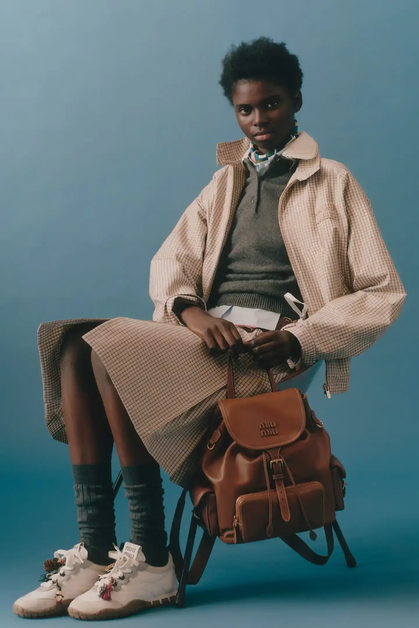 MIU MIU OPENS 2026 WITH PRELUDE COLLECTION Miu Miu introduces Prelude collection for 2026, featuring workwear-inspired pieces, two new sneaker models with customization options, and a range of bags and ready-to-wear items. (image 5 of 11)