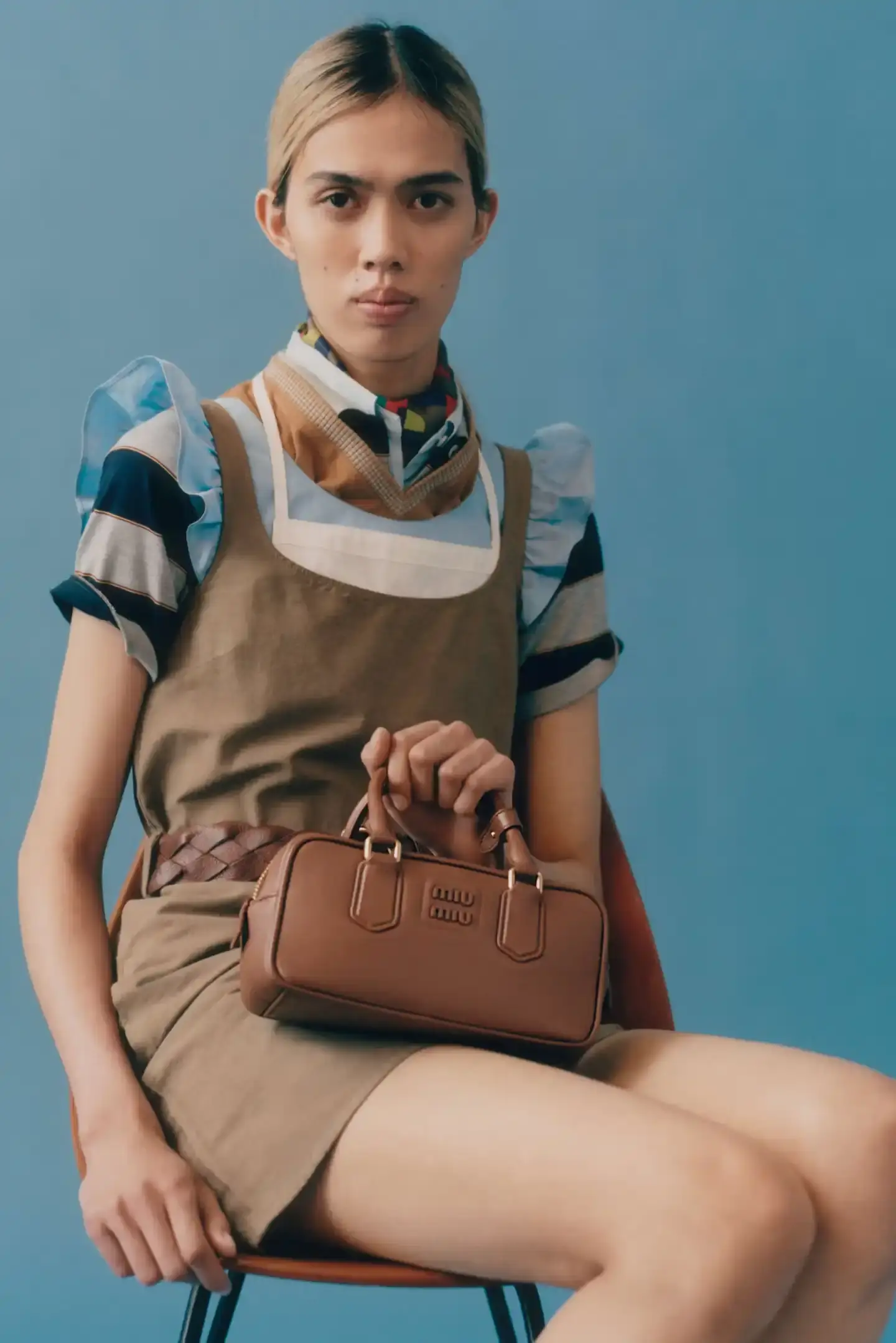 MIU MIU OPENS 2026 WITH PRELUDE COLLECTION Miu Miu introduces Prelude collection for 2026, featuring workwear-inspired pieces, two new sneaker models with customization options, and a range of bags and ready-to-wear items. (image 10 of 11)