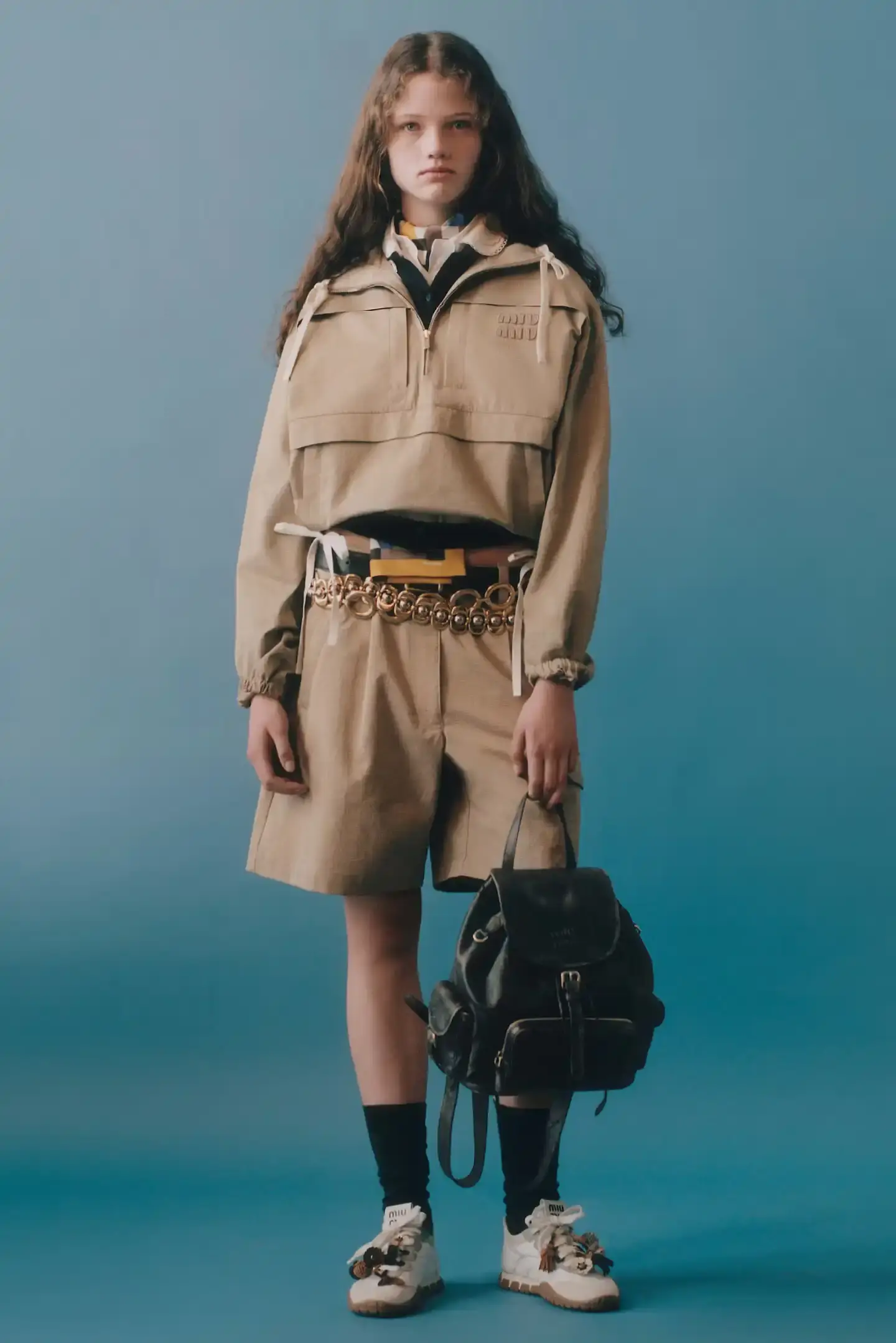 MIU MIU OPENS 2026 WITH PRELUDE COLLECTION Miu Miu introduces Prelude collection for 2026, featuring workwear-inspired pieces, two new sneaker models with customization options, and a range of bags and ready-to-wear items. (image 4 of 11)
