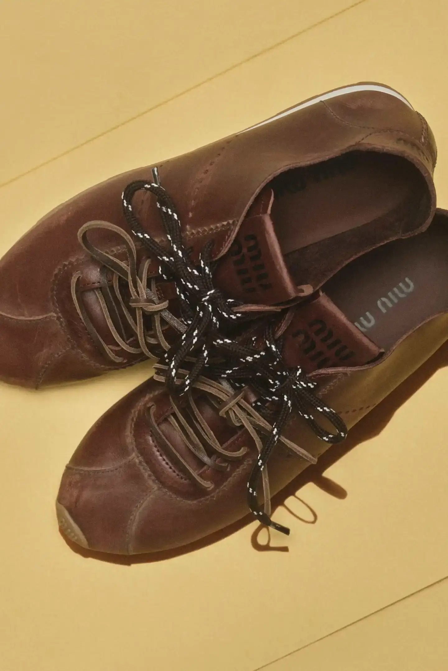 MIU MIU OPENS 2026 WITH PRELUDE COLLECTION Miu Miu introduces Prelude collection for 2026, featuring workwear-inspired pieces, two new sneaker models with customization options, and a range of bags and ready-to-wear items. (image 1 of 10)