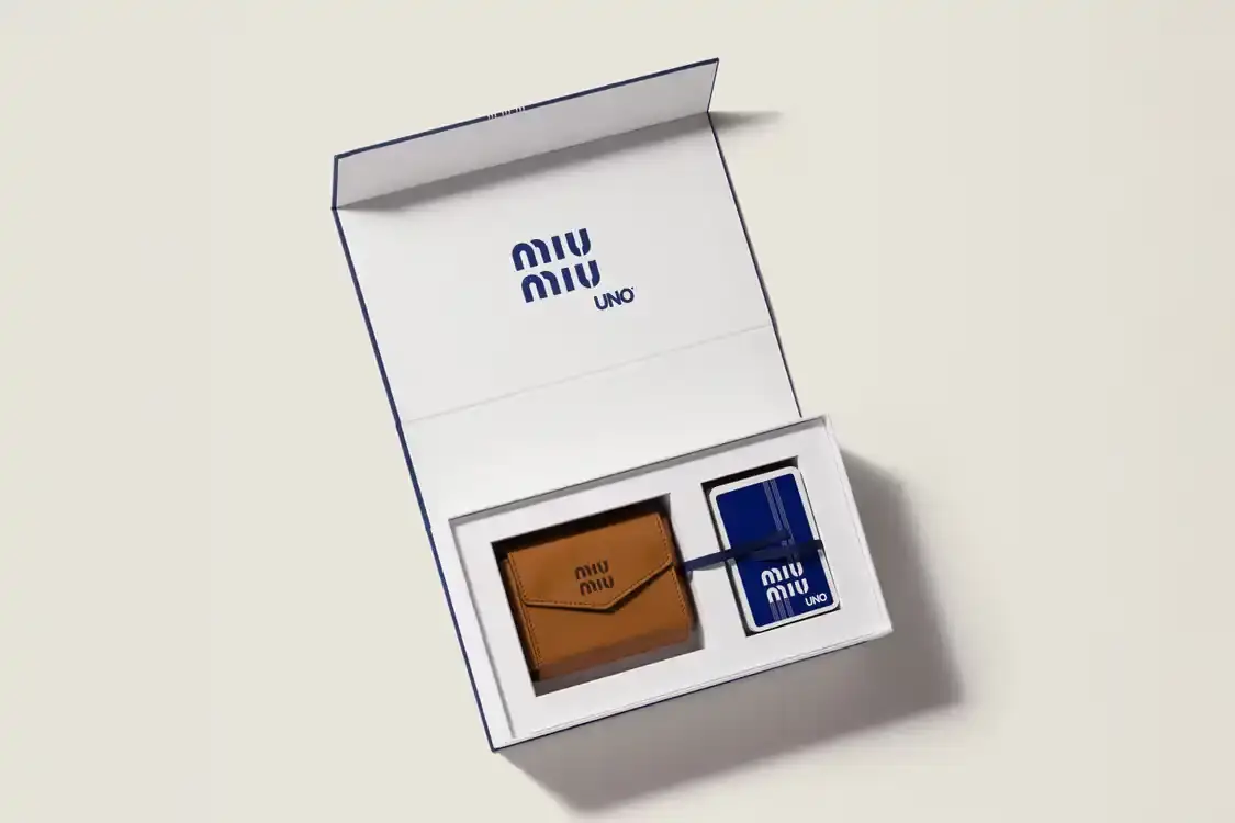 MIU MIU X UNO CARD GAME SET RETAILS FOR $600 Miu Miu releases a collector's edition UNO card set for $600, featuring custom artwork and a leather case in Cognac and Palisander colors.