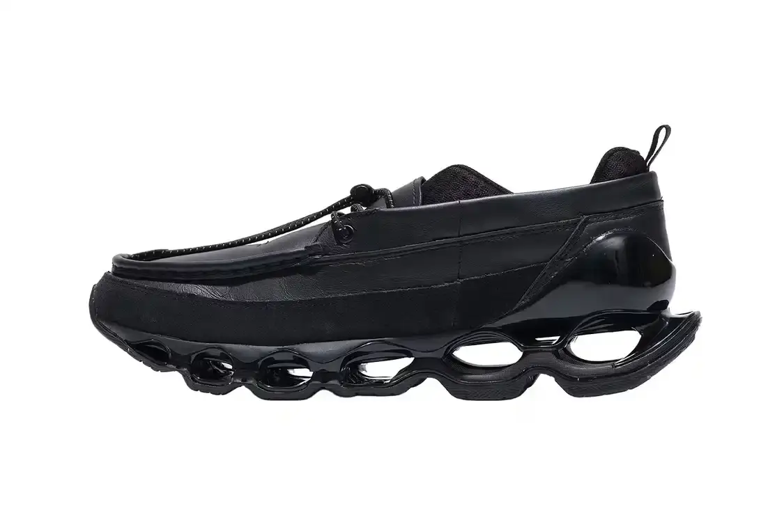 MIZUNO WAVE PROPHECY MOC DROPS IN ALL-BLACK Image shows the Mizuno WAVE PROPHECY MOC sneaker in an all-black colorway featuring leather upper construction, U-shaped moccasin stitching, and the brand's Infinity Wave plate technology.