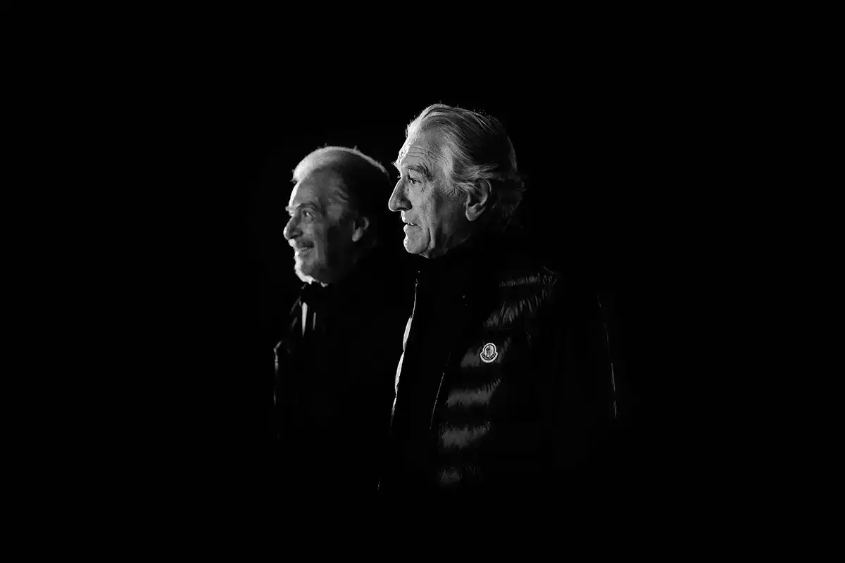 MONCLER AD CAMPAIGN REUNITES DE NIRO AND PACINO Black and white portraits of actors Al Pacino and Robert De Niro wearing Moncler outerwear for the Warmer Together campaign. (image 7 of 9)