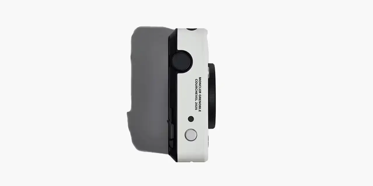 Moncler Limited edition white Leica camera featuring Moncler logo on front and FW25 Courchevel runway inscription on top, created exclusively for Moncler Grenoble's alpine fashion show guests. (image 3 of 3)