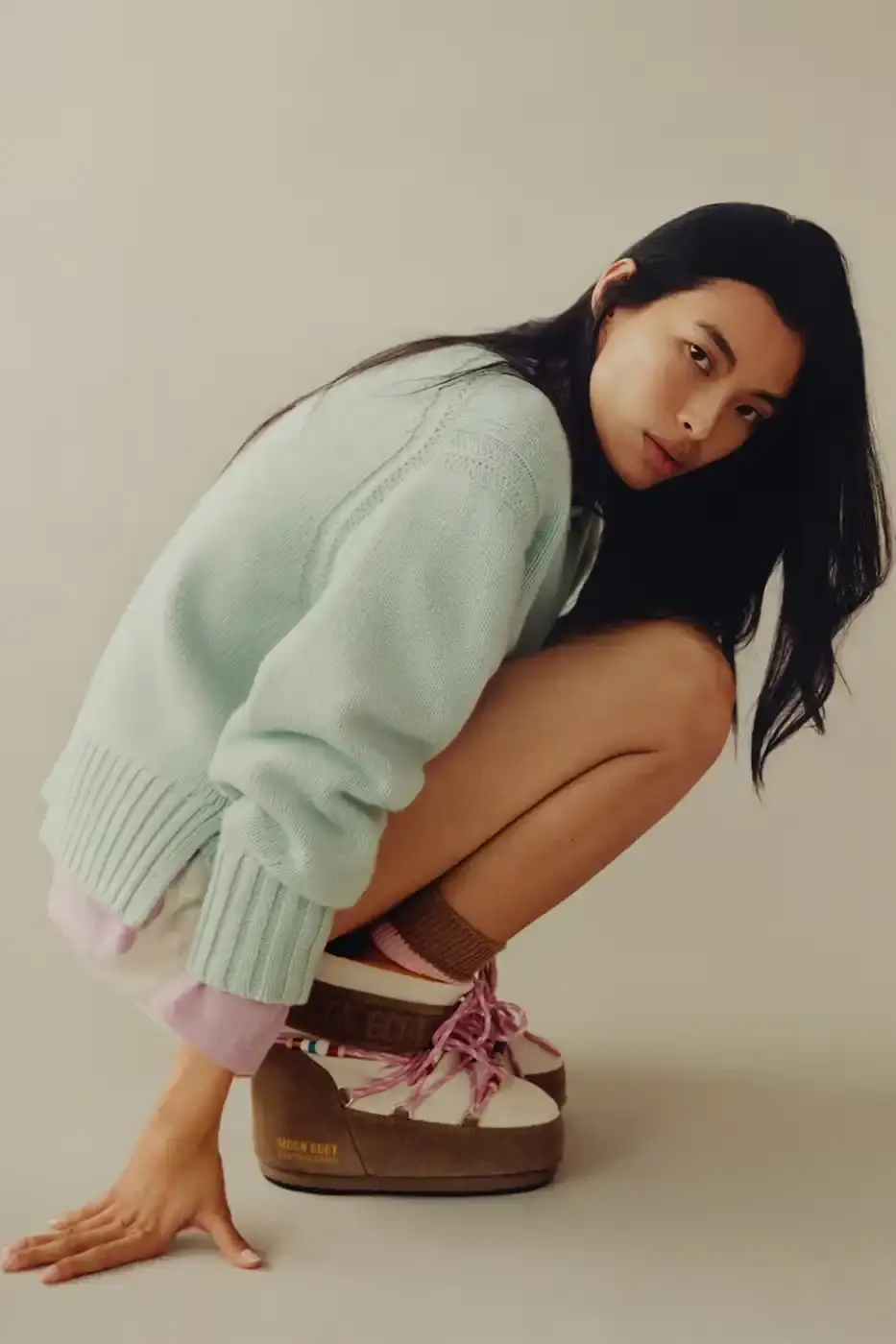 MOON BOOT AND GUEST IN RESIDENCE DROP WINTER 2025 COLLECTION Fashion collaboration between Moon Boot and Guest in Residence by Gigi Hadid introduces 16 winter boot styles with landscape prints, alpaca wool blends, and bead charm details. (image 15 of 15)