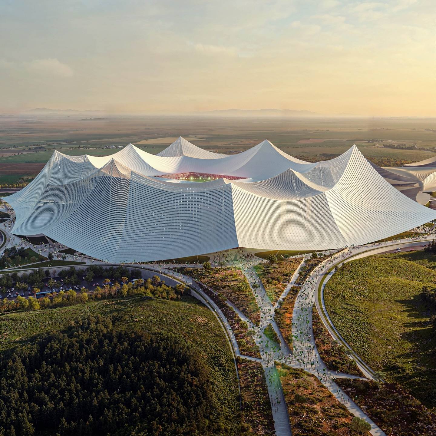 Grand Stade de Casablanca, Morocco's future 115,000-capacity stadium, set to be world's largest. Key venue for 2030 FIFA World Cup co-hosted by Morocco, Spain, and Portugal. Designed by Oualalou + Choi and Populous consortium. Located strategically between Casablanca and Mohammedia. 411 million euro project aims to redefine global sports architecture standards. Features surrounding sports complex for diverse events. Represents Morocco's ambitious vision for international sporting prominence.