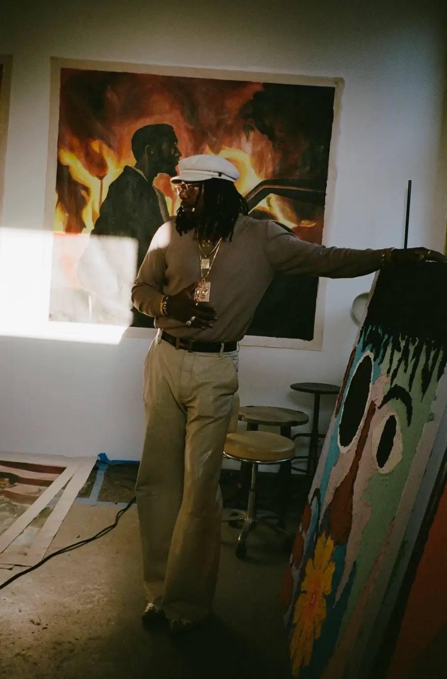 MR STAR CITY ON TURNING PERSONAL EXPERIENCE INTO POWERFUL ART image of the artist Mr Star City. He discusses his painting series, personal loss, family relationships, and artistic process. (image 2 of 4)