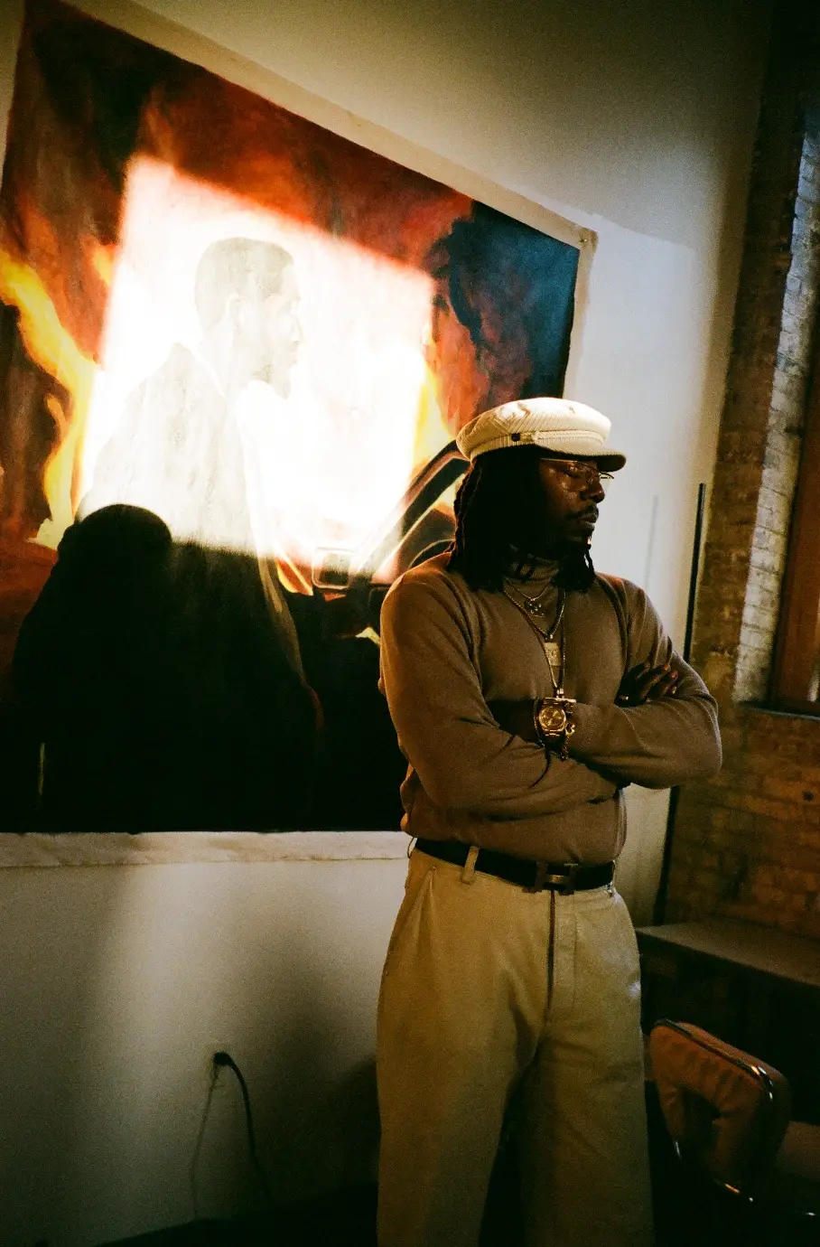MR STAR CITY ON TURNING PERSONAL EXPERIENCE INTO POWERFUL ART image of the artist Mr Star City. He discusses his painting series, personal loss, family relationships, and artistic process. (image 3 of 5)