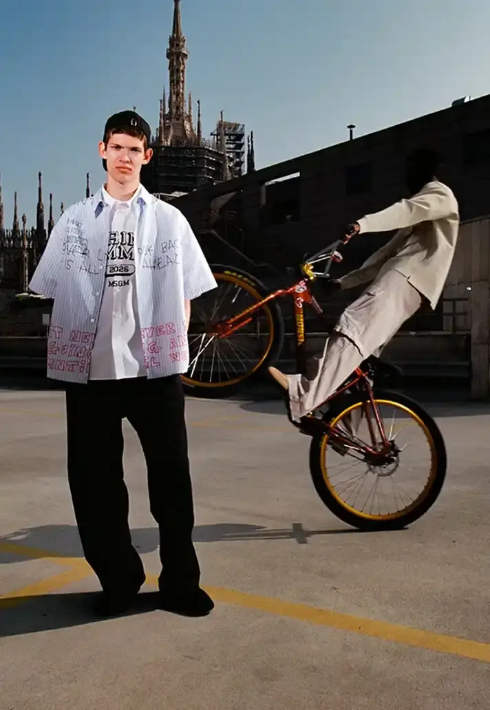 MSGM SS26 TAKES CUES FROM STREET CYCLING image about fashion designer Massimo Giorgetti's Spring/Summer 2026 collection for MSGM brand, inspired by cycling culture and featuring collaboration with Milan cyclists. (image 7 of 34)