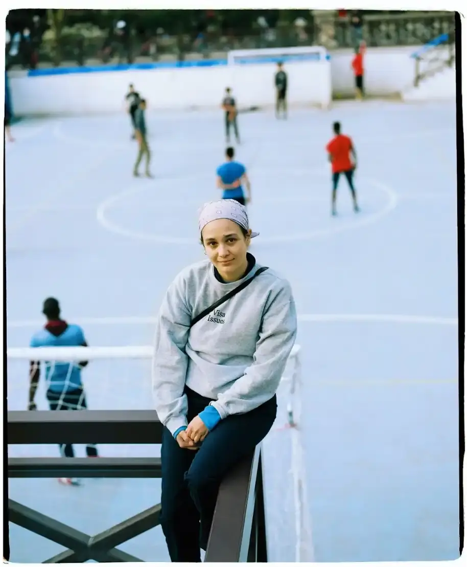 NAOMI ACCARDI: FOOTBALL & FASHION image of interview profile explores the professional journey of Naomi Accardi, an Italian editorial consultant who specializes in the intersection of football, fashion, and creative storytelling. The article details her career progression, from working with brands like Nike and Adidas to founding innovative projects like systemarosa and RISERVE. Accardi discusses her personal experiences in the football and fashion industries, her relationship with her father, and her approach to creativity, offering insights into her multifaceted professional identity and passion for sports culture. (image 3 of 5)
