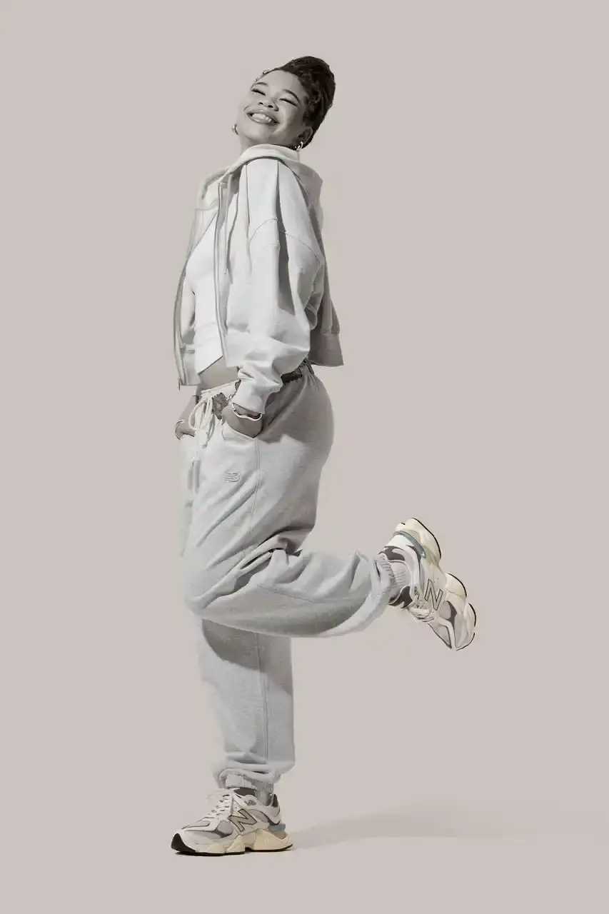 THE RETURN OF GRAY DAYS: NEW BALANCE'S ANNUAL MAY CELEBRATION image of the New Balance's annual Gray Days celebration happening throughout May 2025. It details the complete release schedule of gray-colored sneakers and apparel, beginning with multiple models launching on May 1st including the MT10, 740, and 9060. It mentions that brand representatives Aminé and Cameron Brink appear in the promotional lookbook. The article provides specific release dates for notable models like the 1906L sneaker loafer (May 14th), the ABZORB 2010 and 471 silhouettes (May 22nd), Andrew Reynolds' Numeric 933 (May 26th), and the 1300JP (May 29th). Products will be available through New Balance and select retailers, priced between $40 and $330. (image 5 of 10)