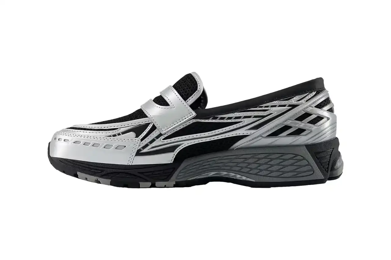 New Balance Overhead view of the New Balance 1906L showing black mesh upper with silver metallic overlays and black laces (image 2 of 5)