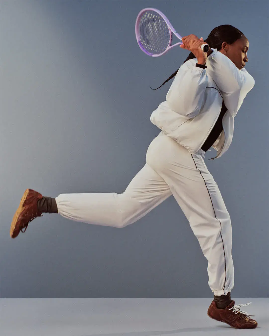NEW BALANCE AND MIU MIU LAUNCH COCO GAUFF LINE image detailing the performance tennis clothing collaboration between New Balance and Miu Miu worn by athlete Coco Gauff. (image 11 of 12)