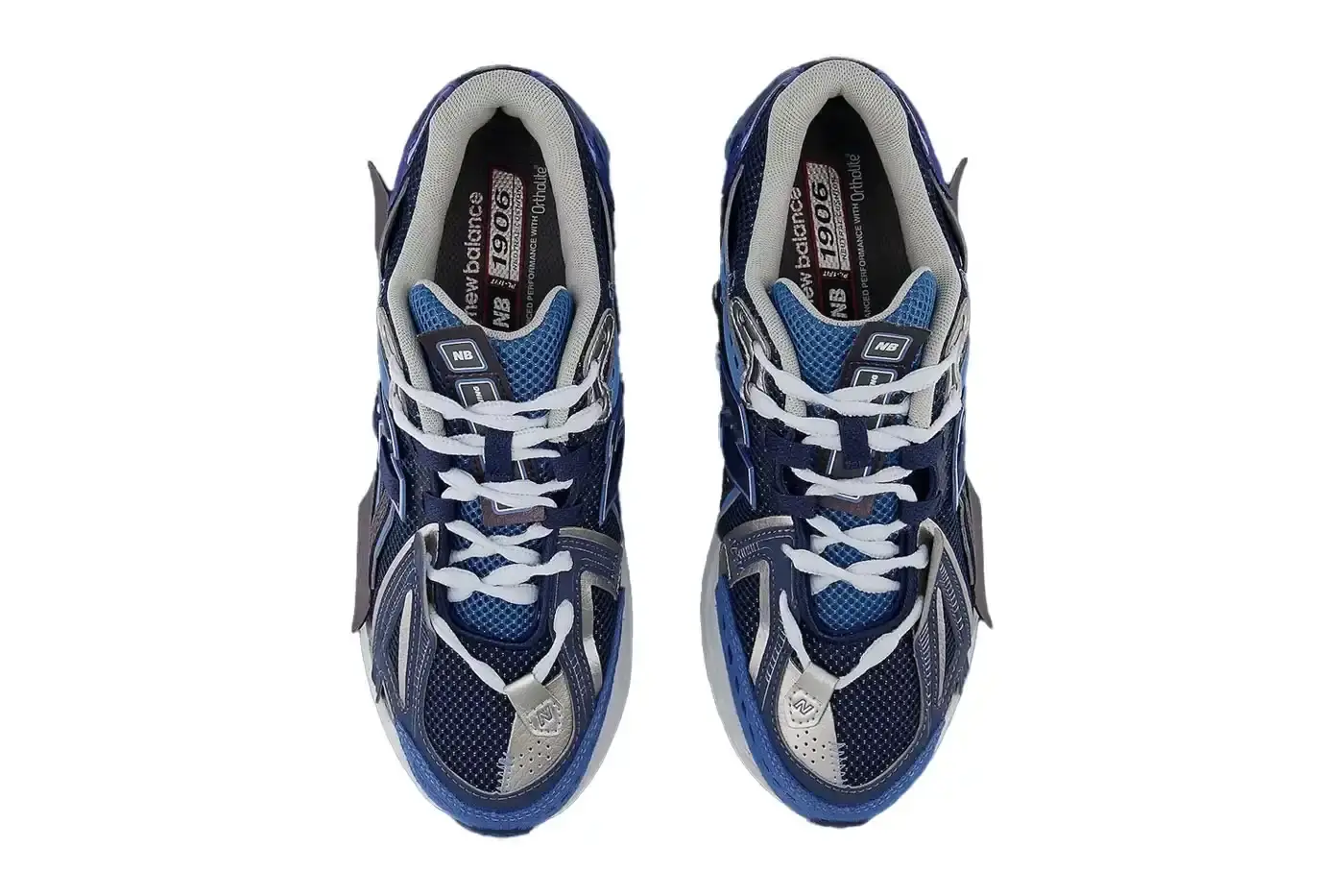 New Balance New Balance 1906A sneaker in Navy and Vintage Indigo colorway. The shoe features a mesh and synthetic upper with blue suede toe cap, ultramarine stripes on the sides, and a Sea Stone-colored midsole. Multiple shades of blue create a layered, technical appearance typical of Y2K-era running shoes. (image 4 of 6)