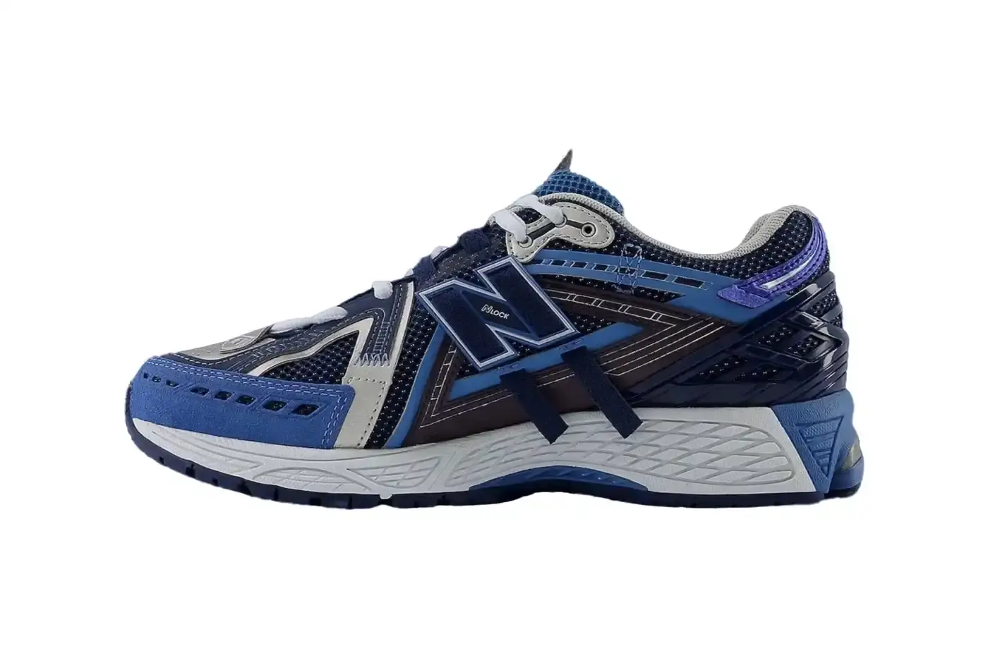 New Balance New Balance 1906A sneaker in Navy and Vintage Indigo colorway. The shoe features a mesh and synthetic upper with blue suede toe cap, ultramarine stripes on the sides, and a Sea Stone-colored midsole. Multiple shades of blue create a layered, technical appearance typical of Y2K-era running shoes. (image 2 of 6)