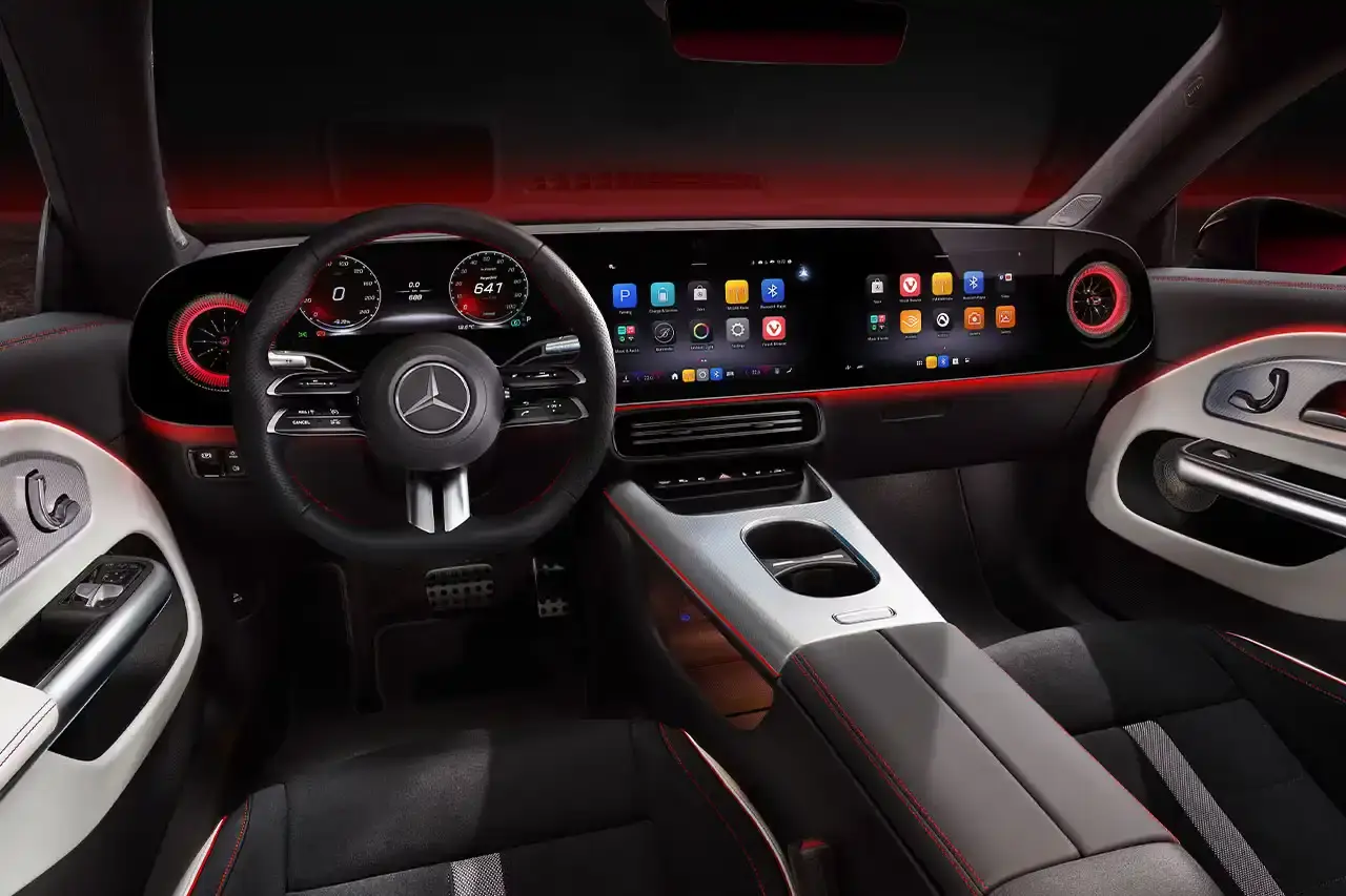 Mercedes-Benz The new Mercedes-Benz CLA sedan featuring a sleek design with illuminated grille, panoramic roof, and minimalist interior with MBUX Superscreen. (image 13 of 13)