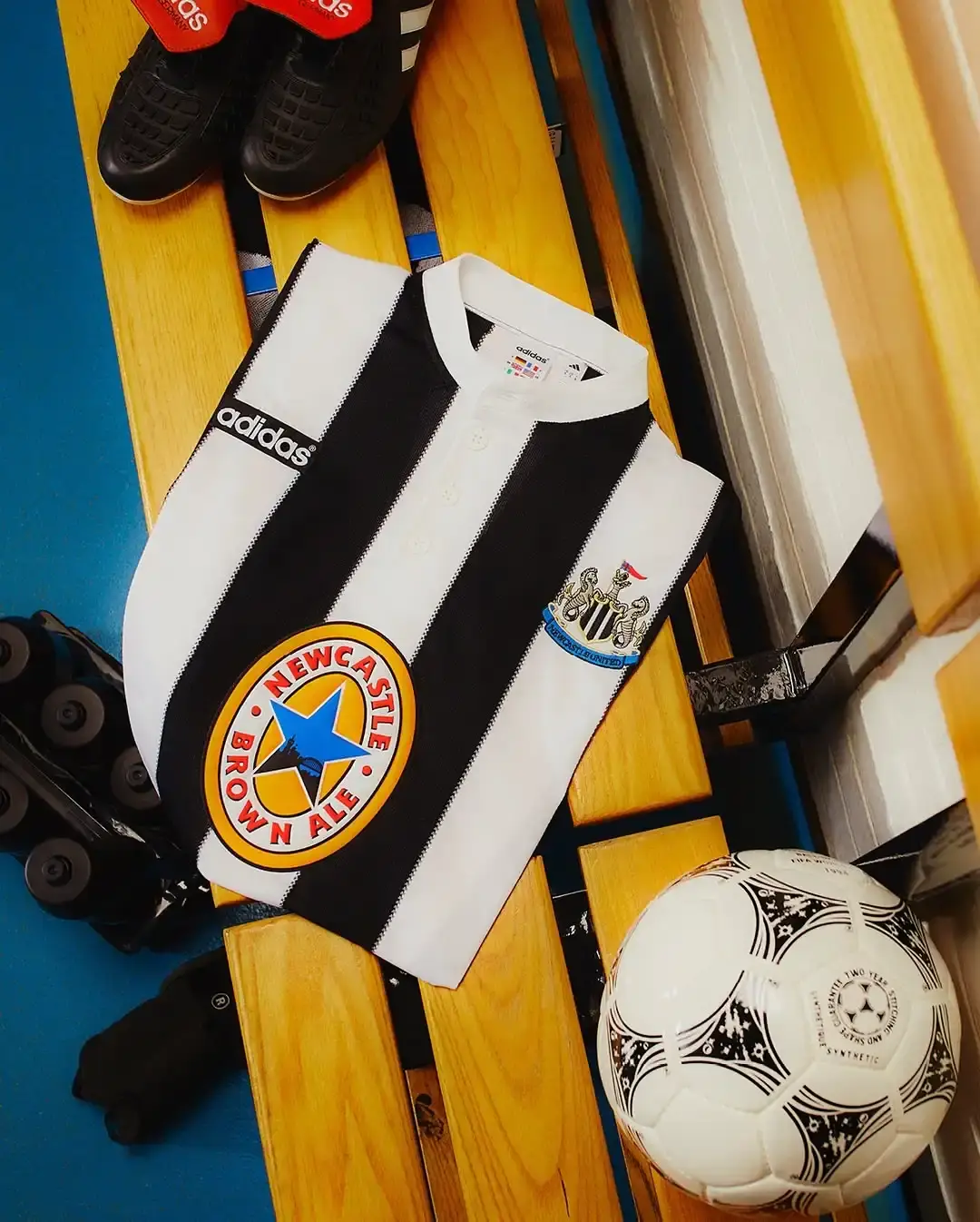 Adidas Newcastle United 1995-96 home shirt remake featuring black and white stripes, Henley collar, adidas trefoil logo, and Newcastle Brown Ale sponsor (image 4 of 5)
